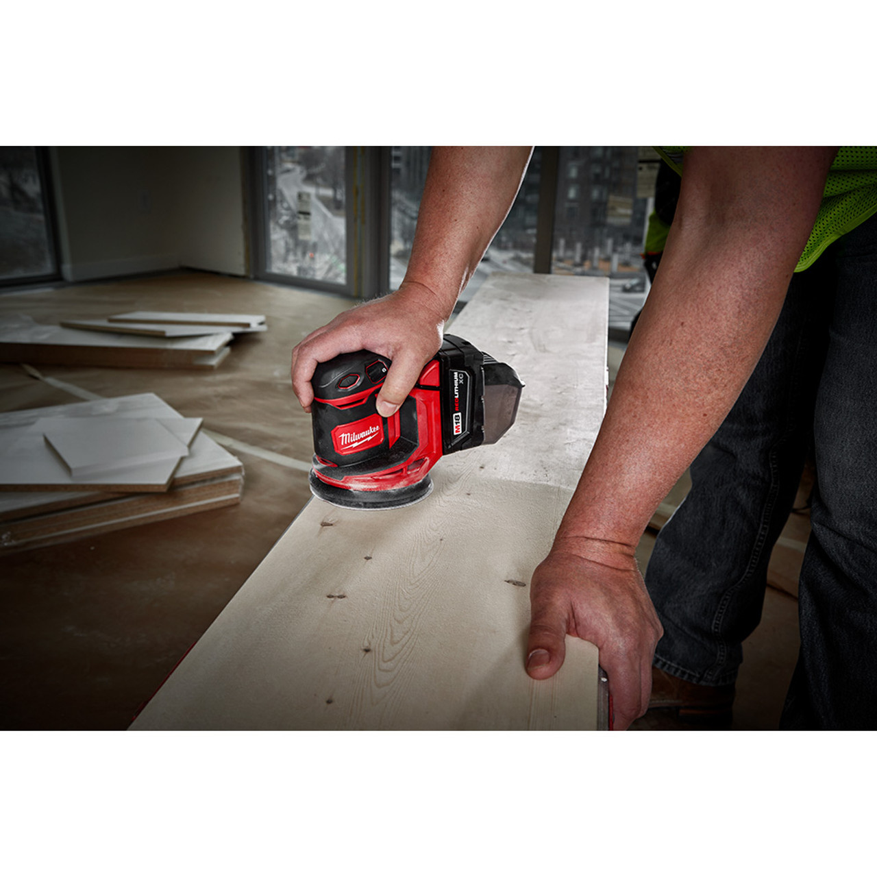 Milwaukee 2648-20 M18 Random Orbit Sander sanding wood (battery sold separately) Milwaukee 2648-20 M18 Random Orbit Sander sanding wood (battery sold separately)