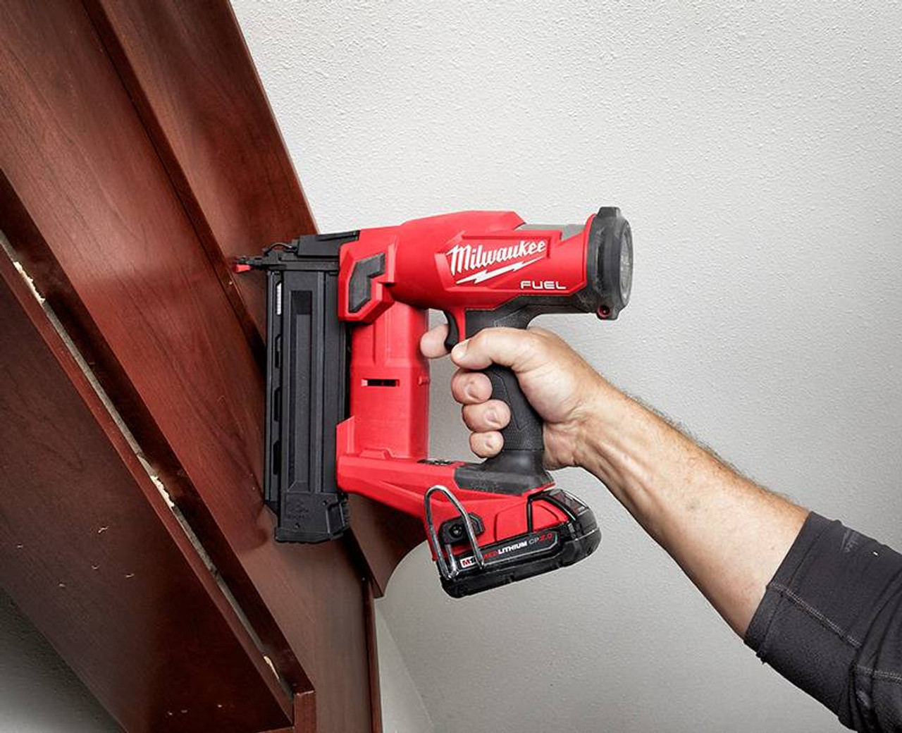 Milwaukee 2746-20 M18 FUEL 18 Gauge Brad Nailer driving nails into wood (battery sold separately) Milwaukee 2746-20 M18 FUEL 18 Gauge Brad Nailer driving nails into wood (battery sold separately)