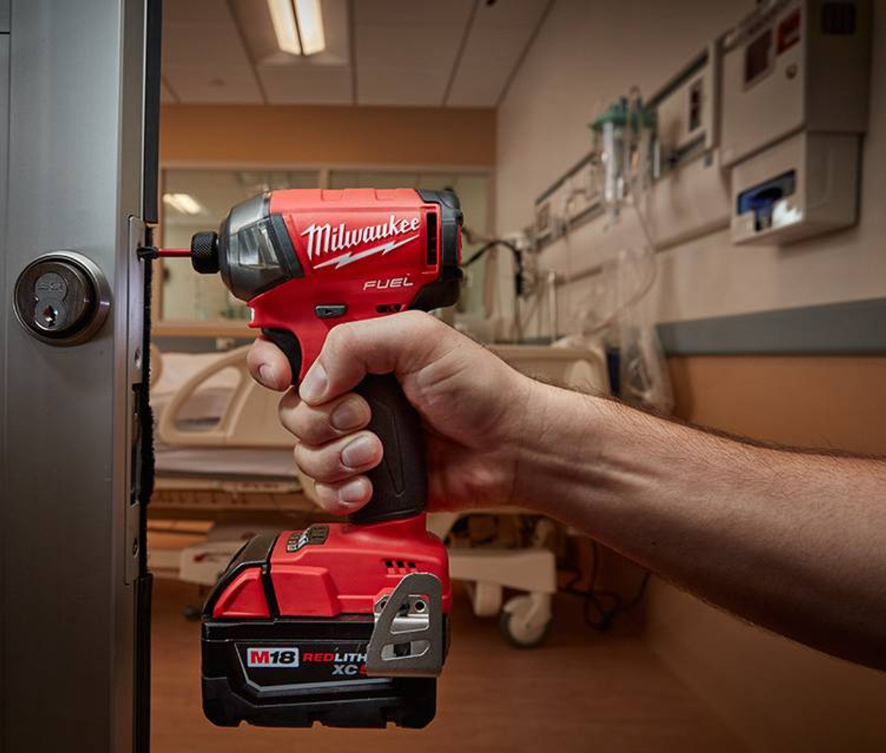 Milwaukee 2760-20 M18 FUEL SURGE 14 Hex Hydraulic Driver driving screw into metal frame (battery sold separately) Milwaukee 2760-20 M18 FUEL SURGE 14 Hex Hydraulic Driver driving screw into metal frame (battery sold separately)