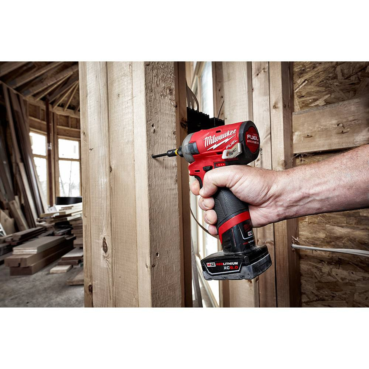 Milwaukee 2551-20 M12 FUEL SURGE Brushless 1/4 inch Hex Hydraulic Impact Driver driving screw into framing studs (battery & bits sold separately) Milwaukee 2551-20 M12 FUEL SURGE Brushless 1/4 inch Hex Hydraulic Impact Driver driving screw into framing studs (battery & bits sold separately)