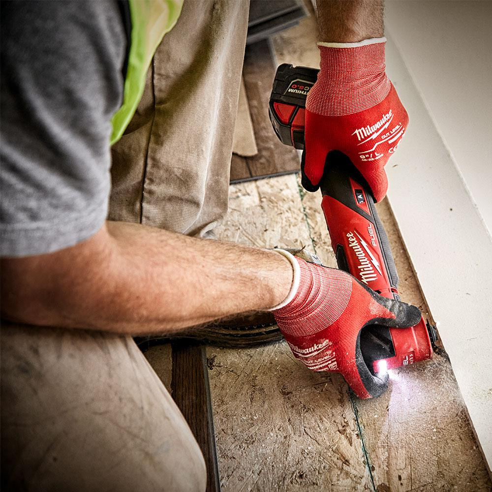 Milwaukee 2836-20 M18 FUEL Oscillating Multi-Tool cutting molding (battery sold separately)