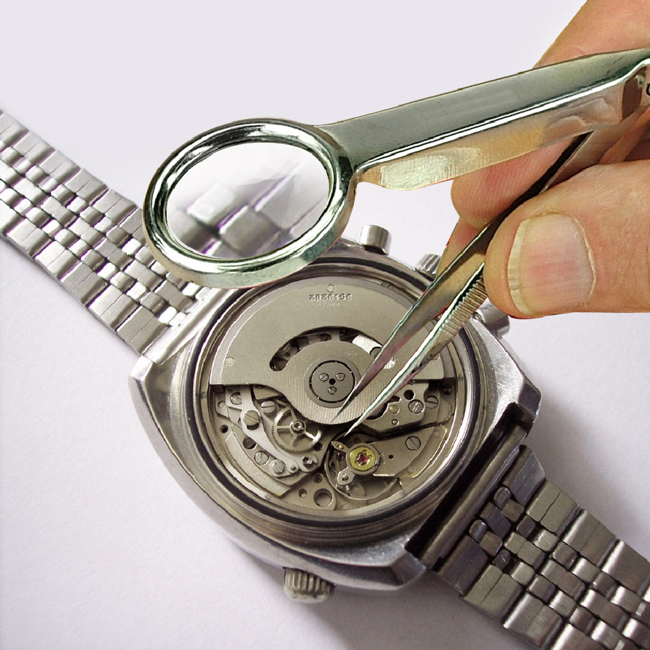 ROK 70102 3.5 inch Tweezers with Magnifier doing fine detail watch repair work