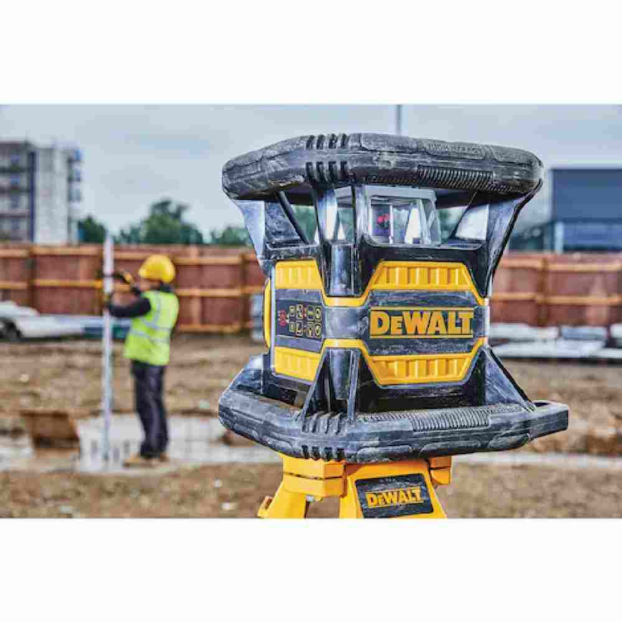 Dewalt DW080LRS 20V Max* Red Tough Rotary Laser Level in use exterior