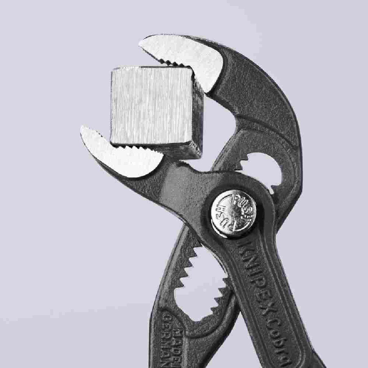 Knipex 8701125SBA 5 inch Cobra Water Pump Plier showing holding square stock Knipex 8701125SBA 5 inch Cobra Water Pump Plier showing holding square stock