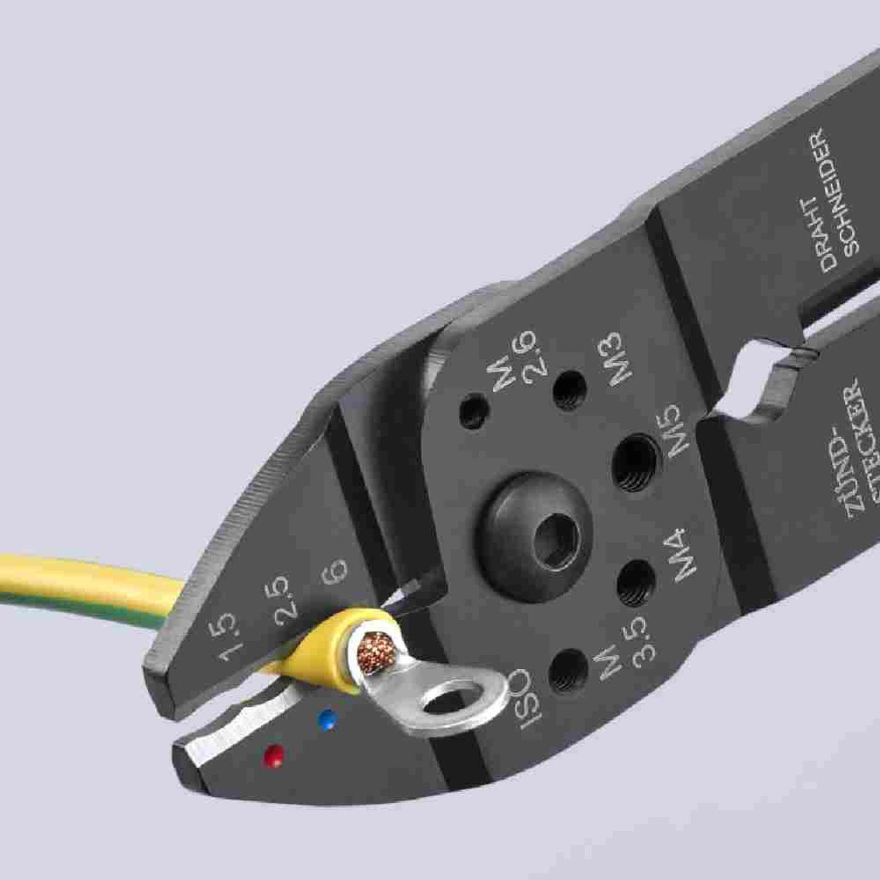 Knipex 9721215SB 9-1/4 inch Crimping Pliers showing in use while crimping  terminal fitting Knipex 9721215SB 9-1/4 inch Crimping Pliers showing in use while crimping  terminal fitting
