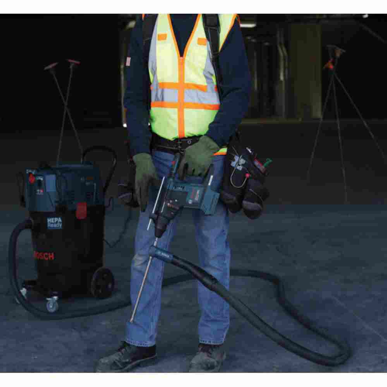 Bosch VAC140AH 9.5 Amp 14-Gallon Wet/Dry Dust Extractor showing vacuum attached to drill dust extractor