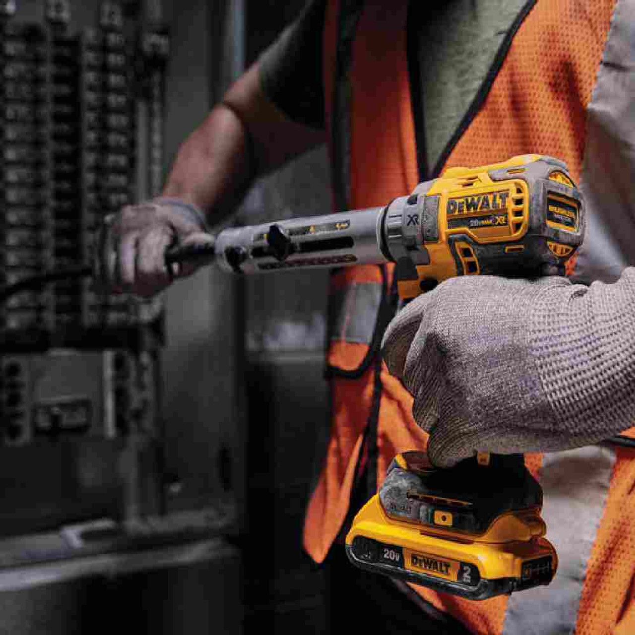 DeWalt DCE151TD1 20V MAX XR Cordless Brushless Cable Stripper Kit showing in use stripping cable to install into a industrial electrical panel