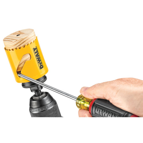 DeWalt DAH180032 2 Inch Bi-Metal Hole Saw showing hole saw having plug removed with screwdriver (Screwdriver sold separately)