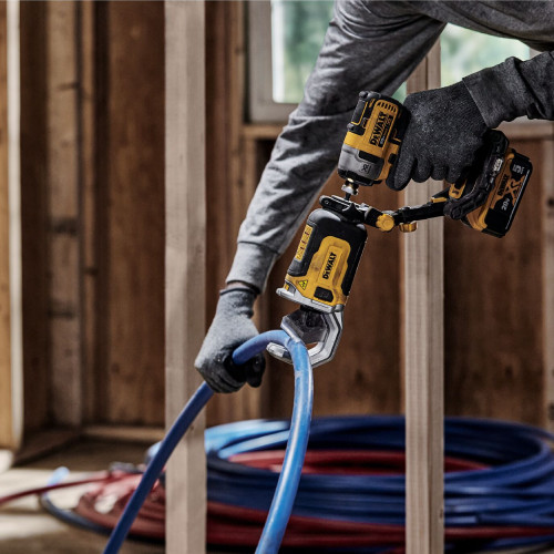 DeWalt DWAPVCIR IMPACT CONNECT PVC/PEX Pipe Cutter Attachment showing in use cutting pex pipe