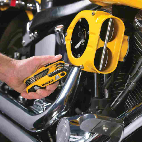 DeWalt DWHT70262M 8pc SAE Folding Locking Hex Key Set showing in use loosening screws in motorcycle engine cavity