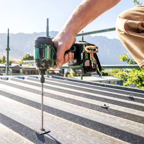 Metabo HPT WH36DCM 36V MultiVolt Cordless Brushless Triple Hammer BOLT Impact Driver Kit showing in use driving screw through sheet metal