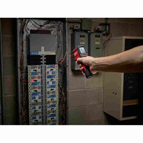 Milwaukee 2267-20 10:1 Infrared Temp-Gun showing reading tempetures from electrical panel