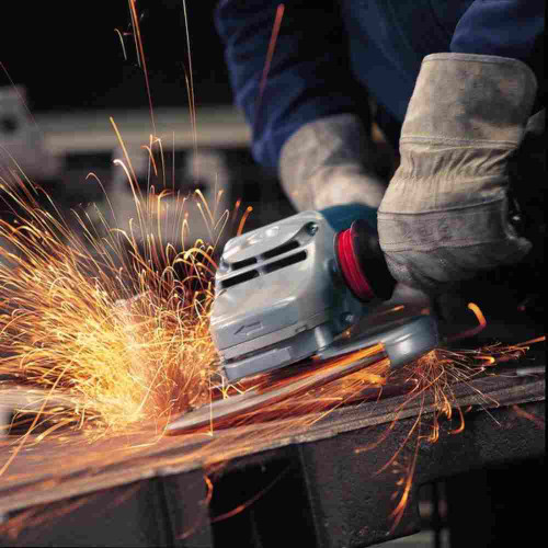 Bosch 1772-6 15 Amp 7 inch Large Angle Grinder with Rat Tail Handle showing in use grinding sheet metal