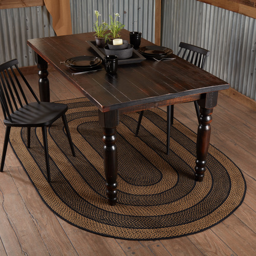 VHC Brands braided jute, oval area rug, 60"x96", in black & tan. Great for dining room floors.