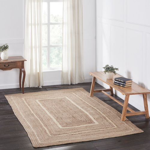 VHC Brands rectangle braided jute rug, natural & cream, 60" x 96", pictured in living room.