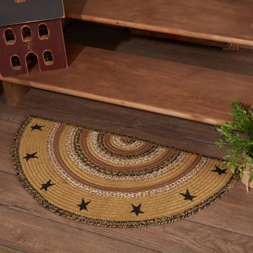 VHC Brands Kettle Grove With Stencil Stars half circle braided jute rug, 16.5" x 33", pictured at the foot of the stairs.