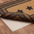 VHC Brands Farmhouse Stencil Stars rectangle braided jute rug in black & tan, 24" x 36", with pad underneath.