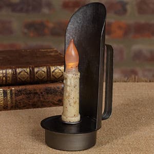 Metal scoop candle holder