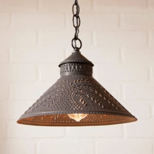 Primitive punched tin pendant light in willow pattern.