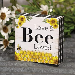 Love and bee loved sign