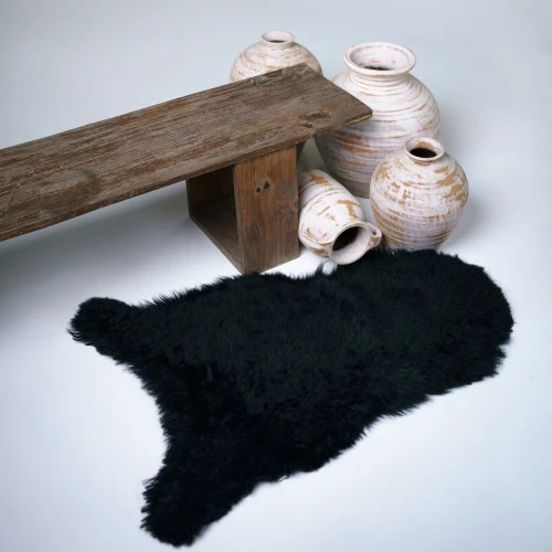 Black genuine sheepskin – plush rug for sofas, chairs, or flooring décor