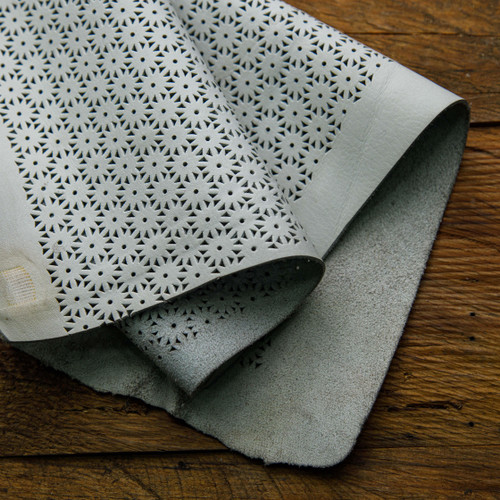 Sunflower laser cut design on off-white leather – premium hide for handbags and leathercraft