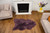 plum sheepskin rug