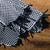 woven black and white leather