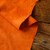 Vibrant goat suede in orange – soft natural leather hide for jackets & shoes