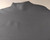 Dark gray hide on a beige background