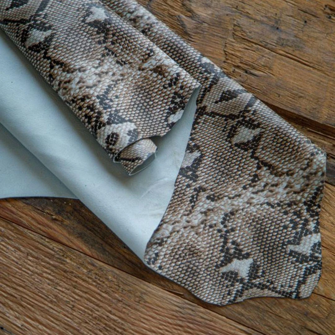 Printed cowhide with snakeskin design – chrome tanned leather hide for handbags and clothing