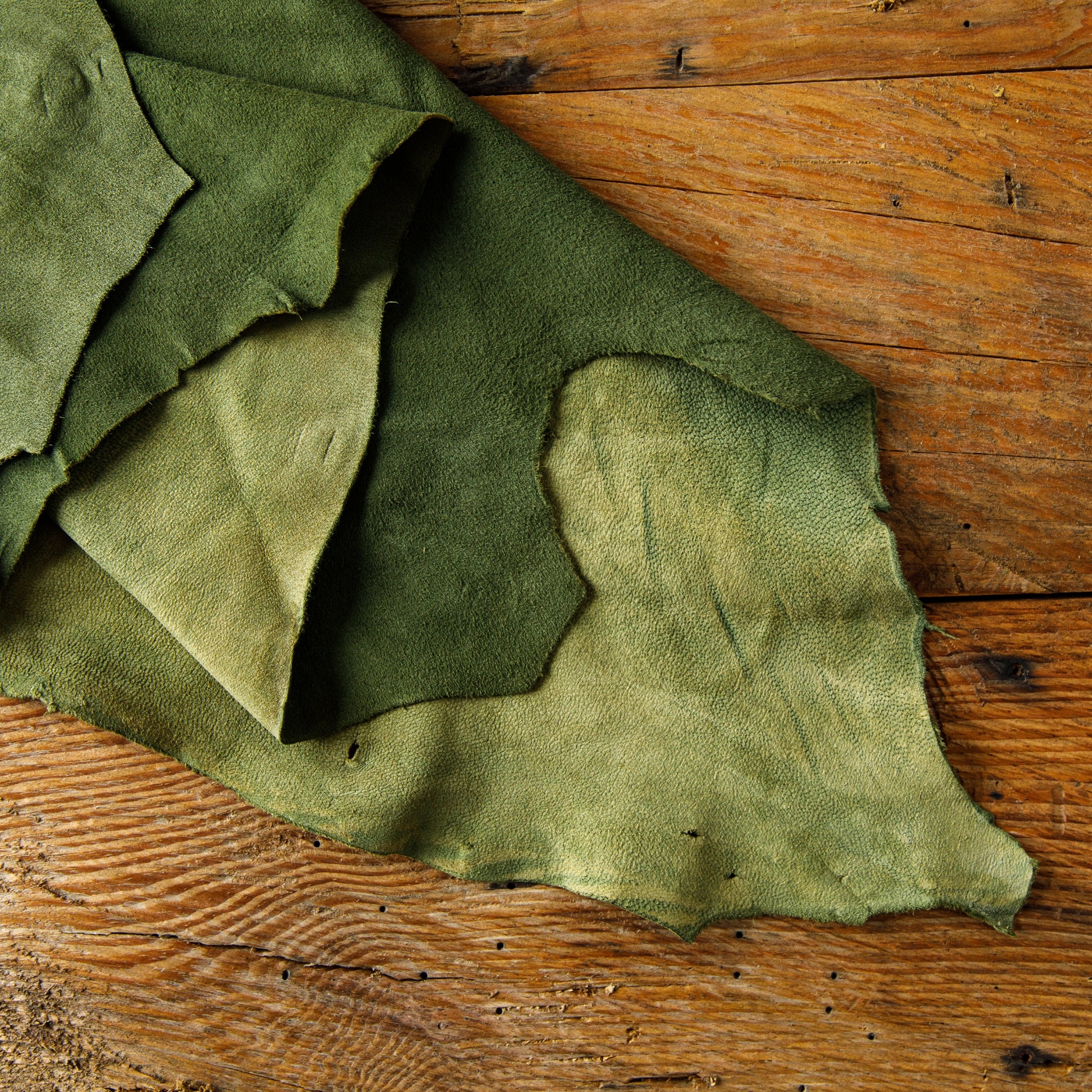Goat suede leather in olive green – velvety finish hide for luxury leathercraft