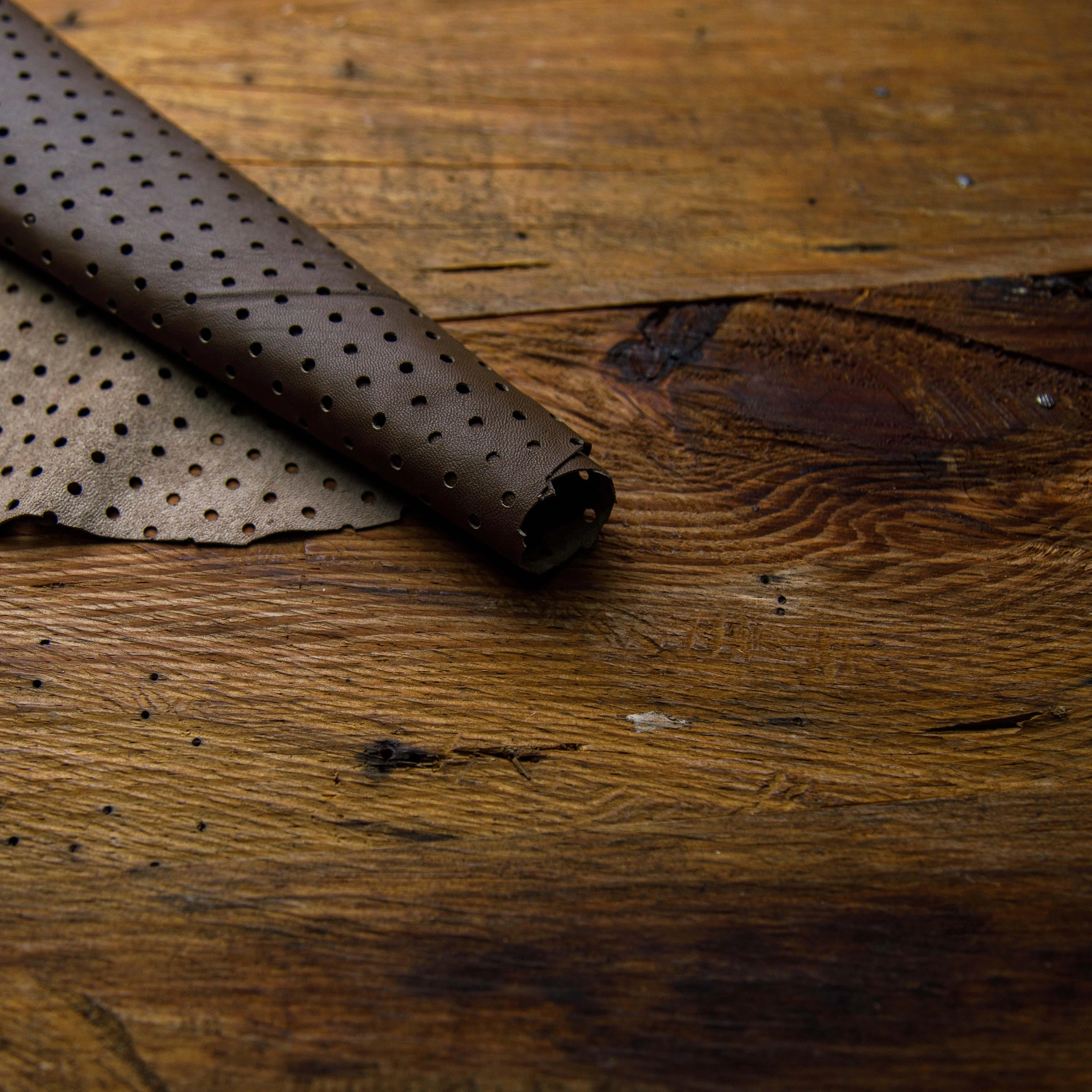 brown perforated rolled leather