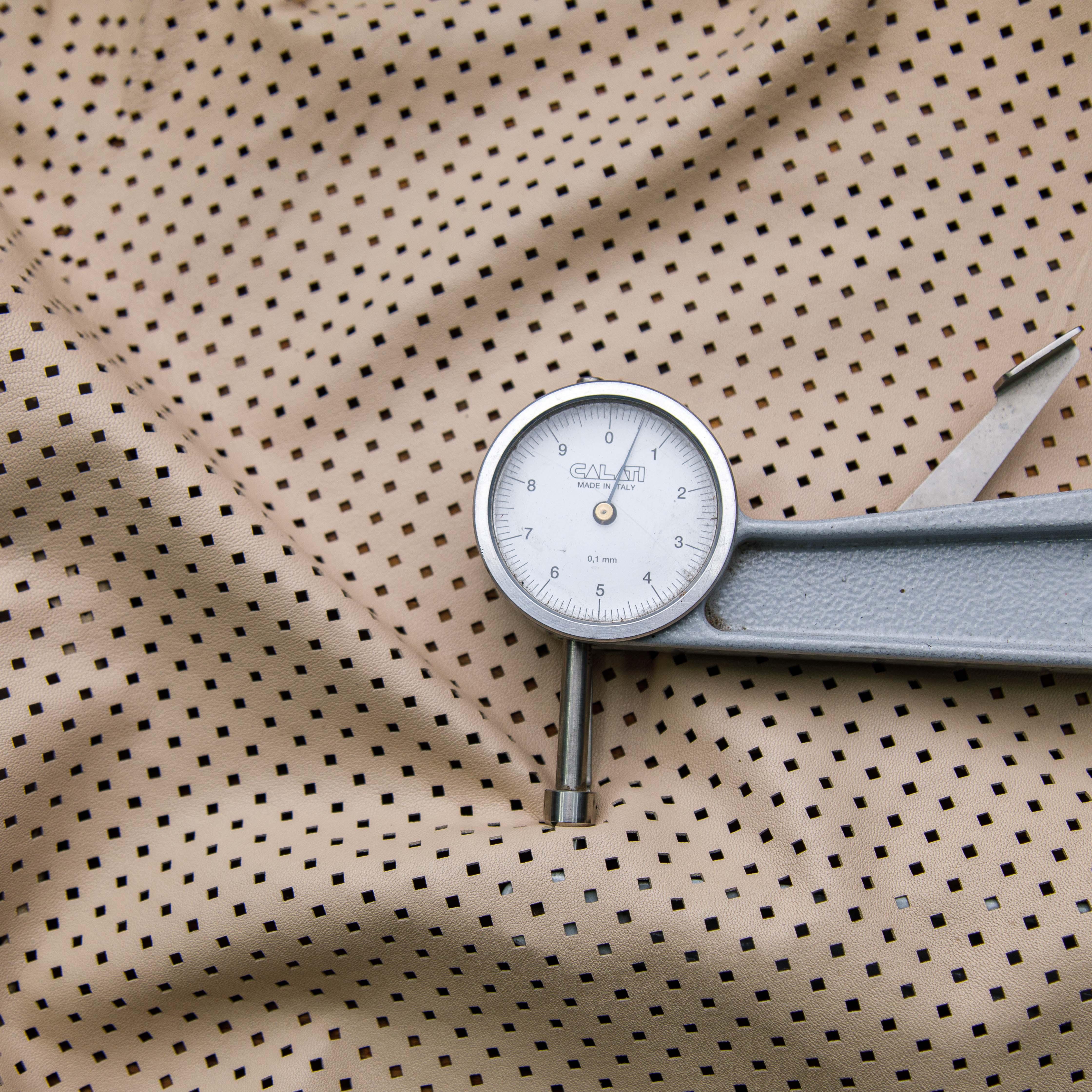 light pink perforated leather hide