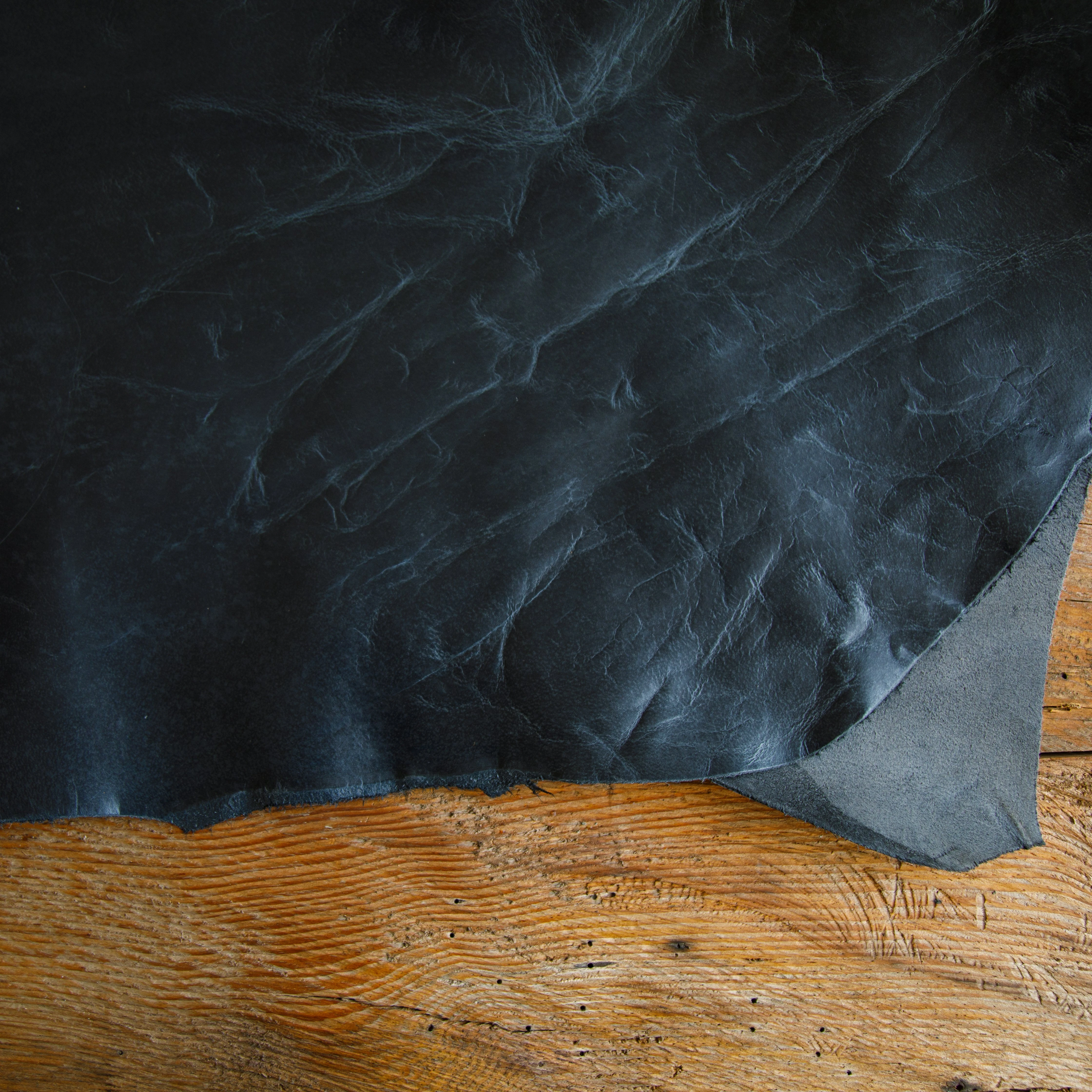 Full-grain black crazy horse leather – distressed finish leather for men’s bags