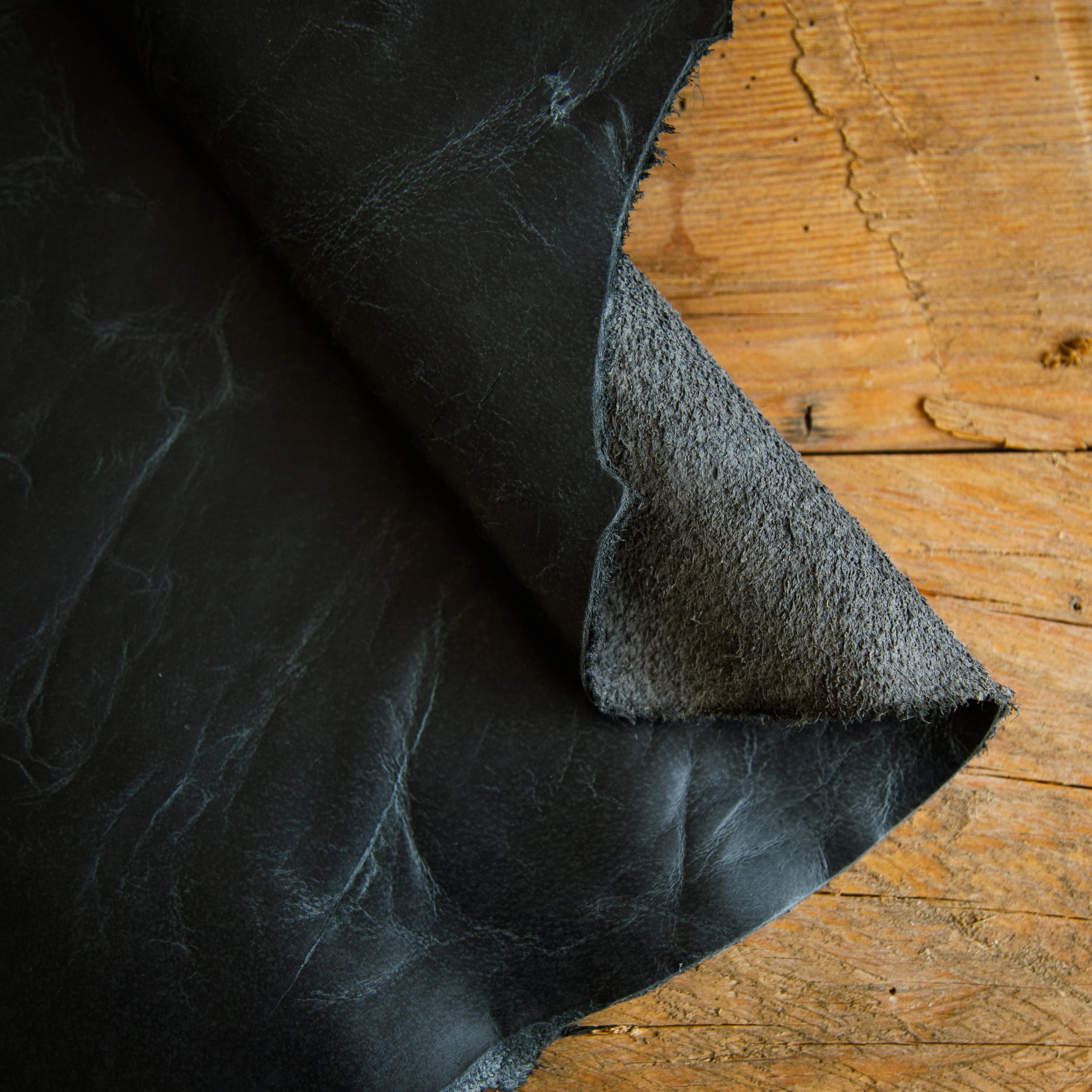 Full-grain black crazy horse leather – distressed finish leather for men’s bags
