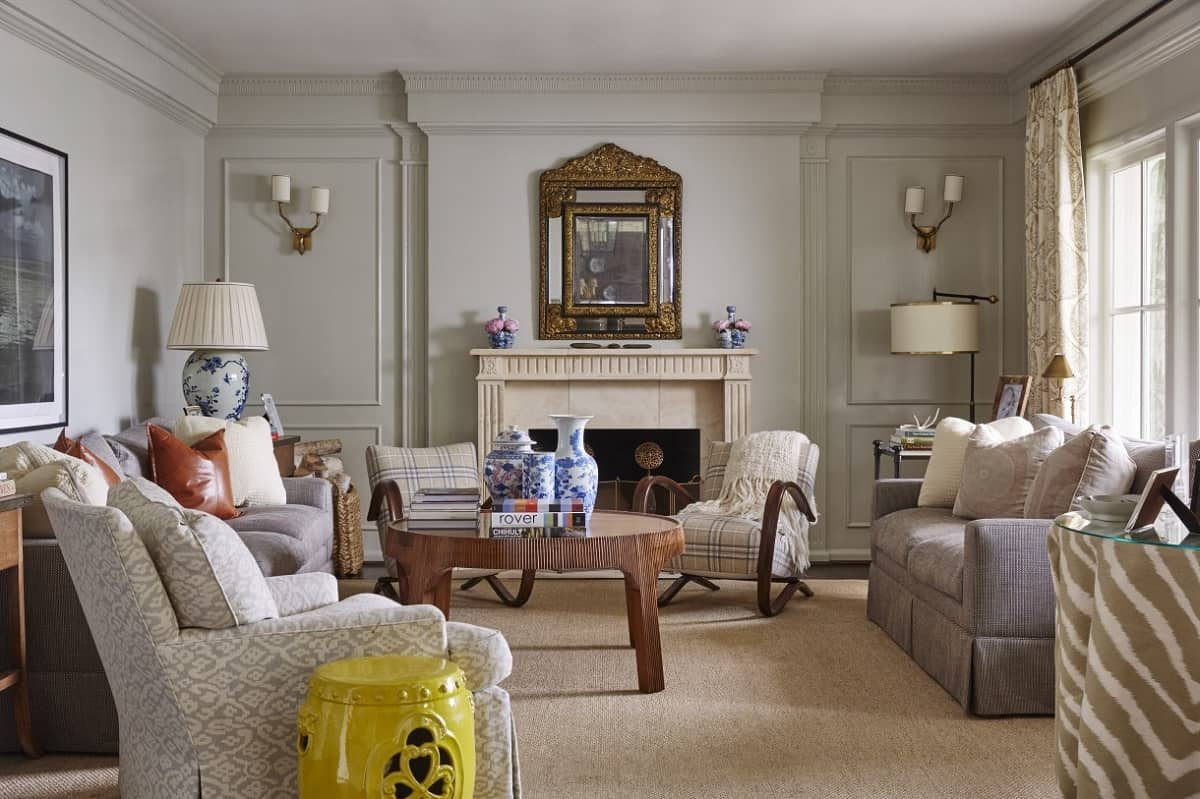 Gray living room with crown and panel moulding
