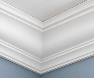 White crown moulding where an interior wall meets the ceiling