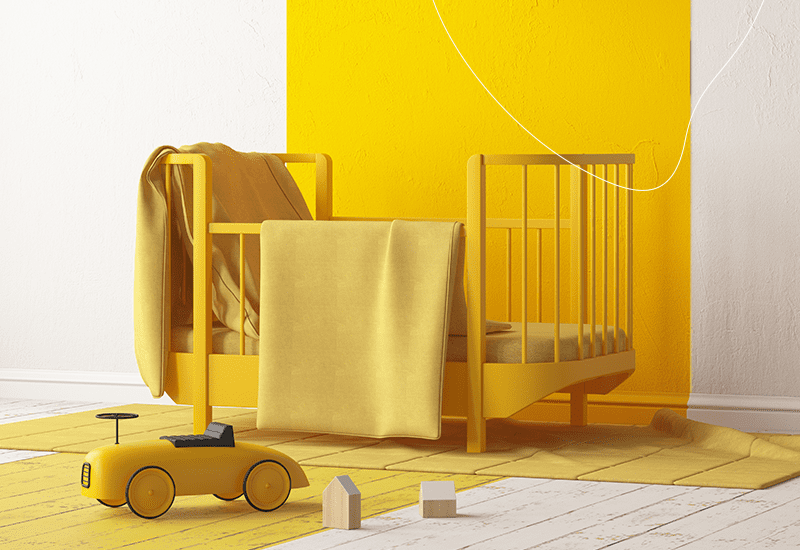 Kinderkamer met een gele tint.