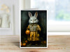 A vintage‑style rabbit holding a glowing jack‑o’‑lantern pumpkin in a dark cottagecore forest setting.