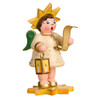 star child angel figurine announcing message on snowy base