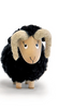 black nordic dreams ram with wooden face, curved horns, and faux‑wool coat