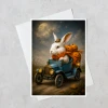 greeting card featuring a whimsical autumn bunny delivering pumpkins displayed with a white envelope