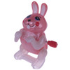 wind‑up flipping bunny toy named barb doing a small acrobatic flip