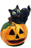 Wide Eyed Cat on Jack-O-Lantern from the Ino Schaller Collection.