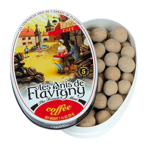“Flavigny Coffee pastilles in a brown vintage tin featuring a French countryside café‑style illustration.”
