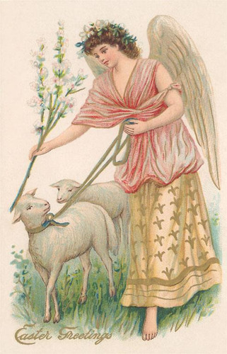 vintage easter postcard with angel in pink and gold guiding two white lambs with flowers
