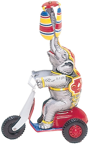 Vintage German tin elephant riding a scooter with spinning overhead blades