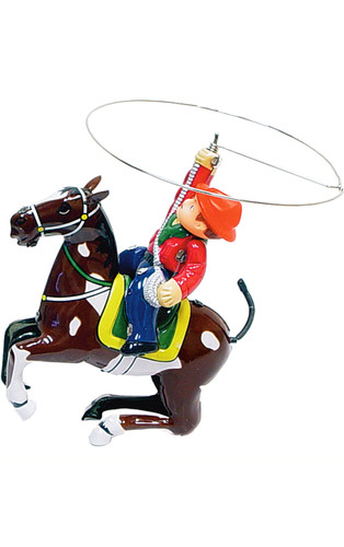 Vintage tin cowboy and horse wind‑up toy with swinging lariat and rearing steed