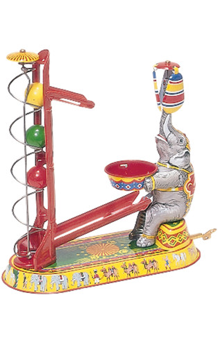 German tin litho wind‑up circus elephant ball game with spiral ramp, propellers, and animal‑parade base